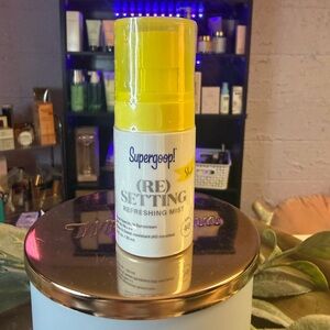 Supergoop! Refreshing Mist SPF 40 in Yellow and White